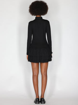 Abito maglia con gonna a balze