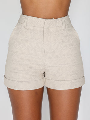 Shorts con motivo a D