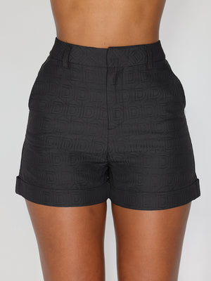 Shorts con motivo a D