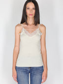 Top a costina in lurex con pizzo