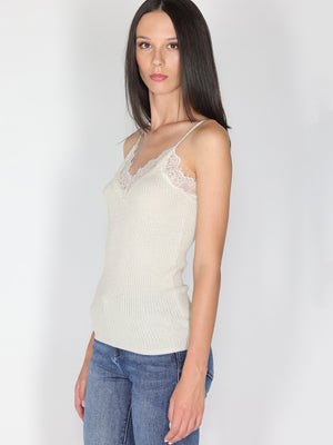 Top a costina in lurex con pizzo