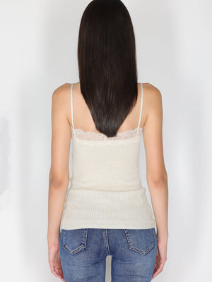 Top a costina in lurex con pizzo