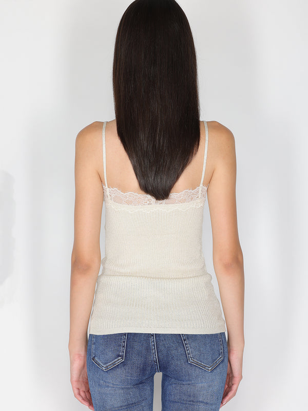 Top a costina in lurex con pizzo