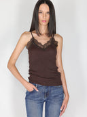 Top a costina in lurex con pizzo