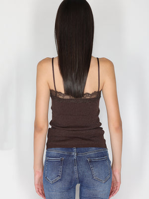 Top a costina in lurex con pizzo