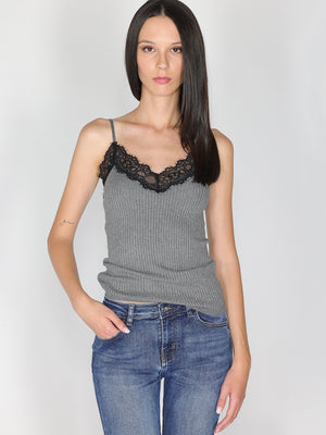 Top a costina in lurex con pizzo