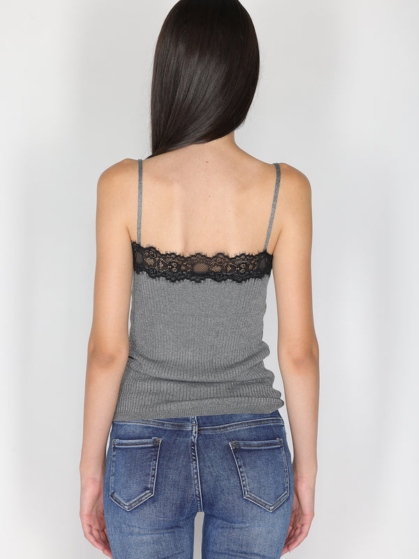 Top a costina in lurex con pizzo