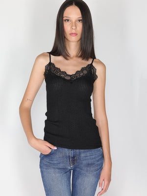 Top a costina in lurex con pizzo