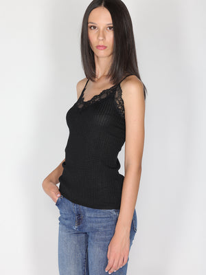 Top a costina in lurex con pizzo