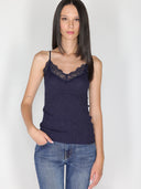 Top a costina in lurex con pizzo