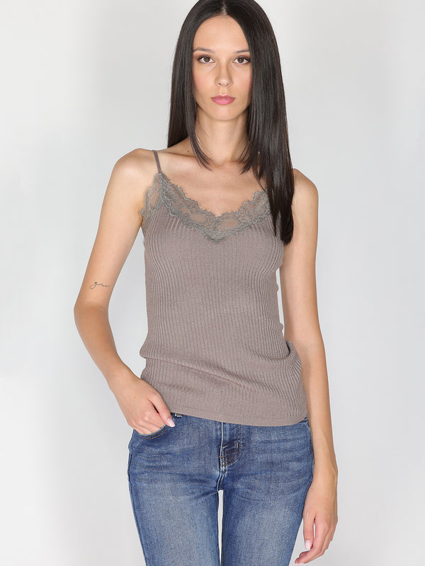Top a costina in lurex con pizzo