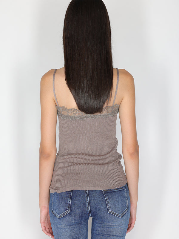 Top a costina in lurex con pizzo