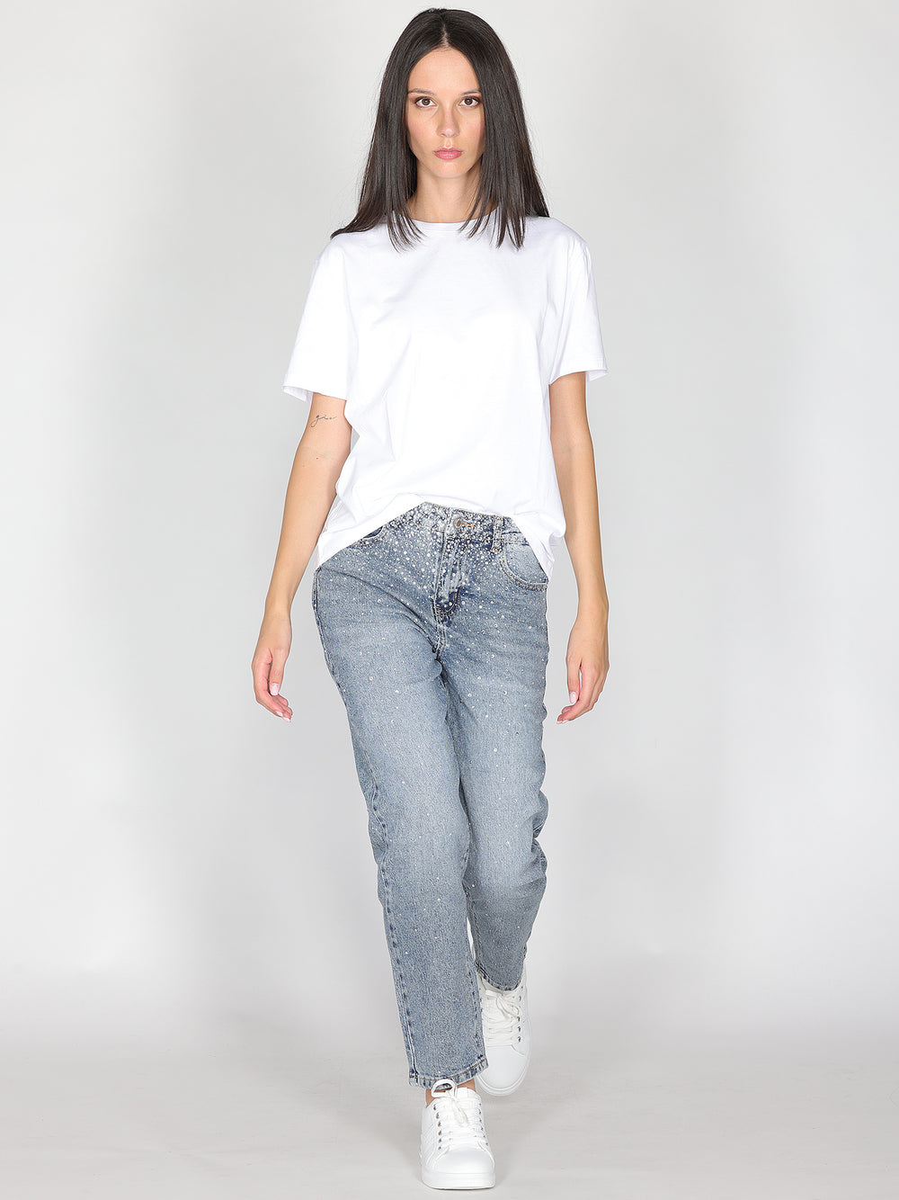 Jeans gamba larga con strass