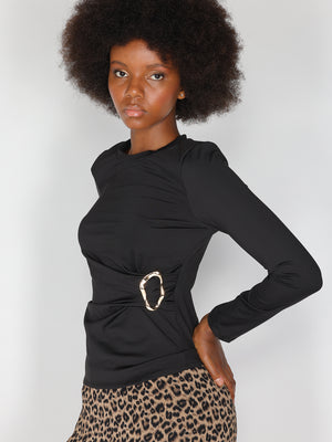 Maglia con gioiello a lato