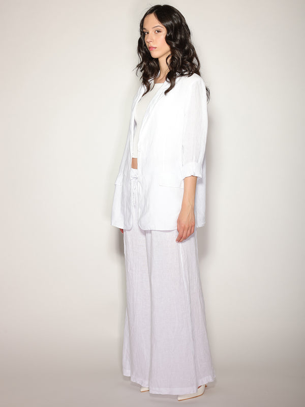 Pantaloni in lino tasche ricamate