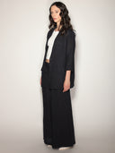 Pantaloni in lino tasche ricamate
