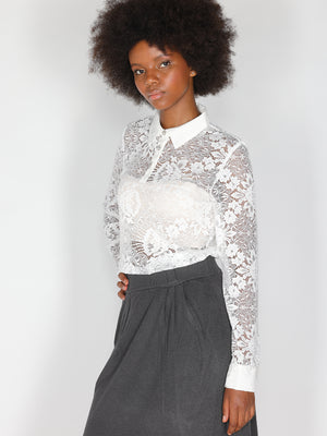 Maglia in pizzo con collo a camicia