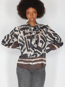 Camicia in fantasia con fiocco