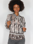 Camicia in fantasia con fiocco