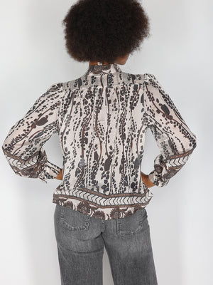 Camicia in fantasia con fiocco