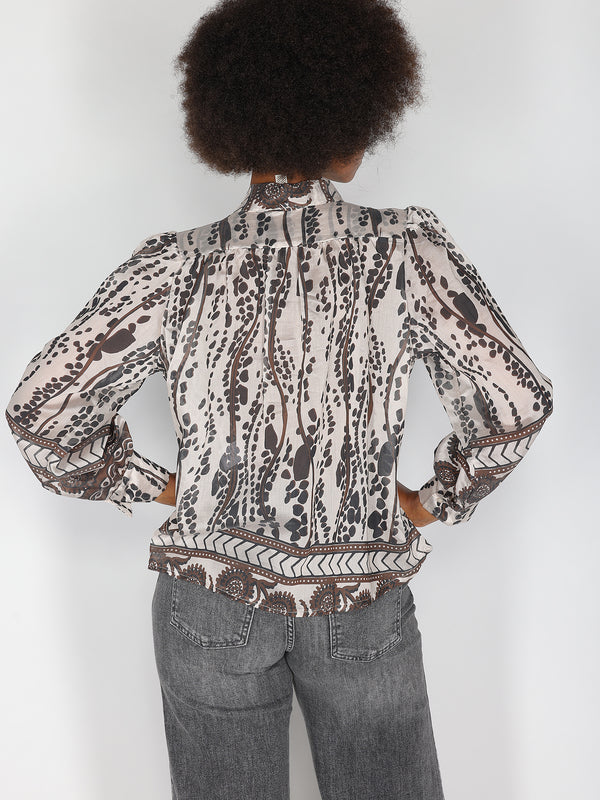 Camicia in fantasia con fiocco