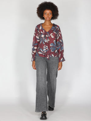 Maglia in fantasia con collo balze