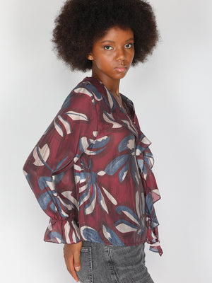 Maglia in fantasia con collo balze