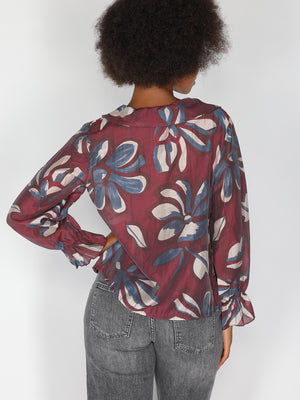 Maglia in fantasia con collo balze