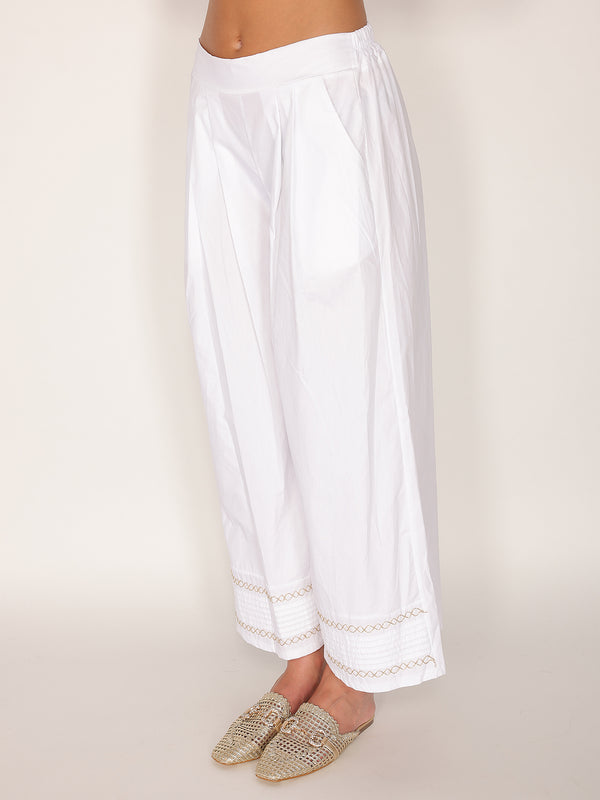 Pantalone in cotone con fondo ricamato