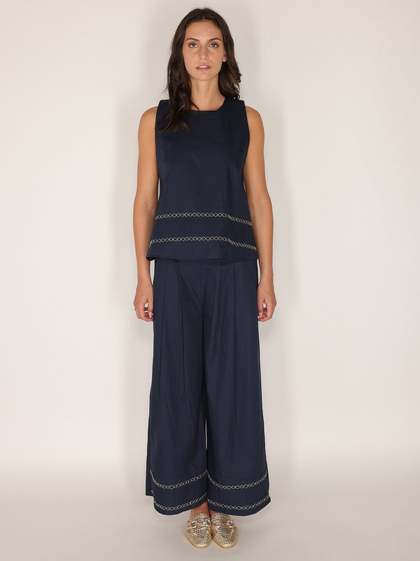 Pantalone in cotone con fondo ricamato