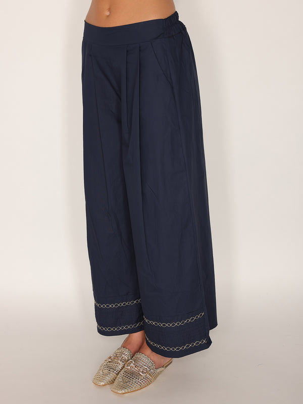 Pantalone in cotone con fondo ricamato