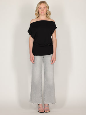 Maglia con bottone laterale