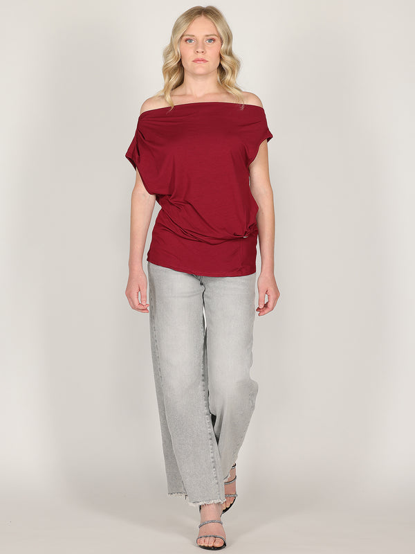 Maglia con bottone laterale