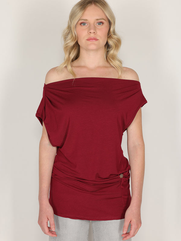 Maglia con bottone laterale