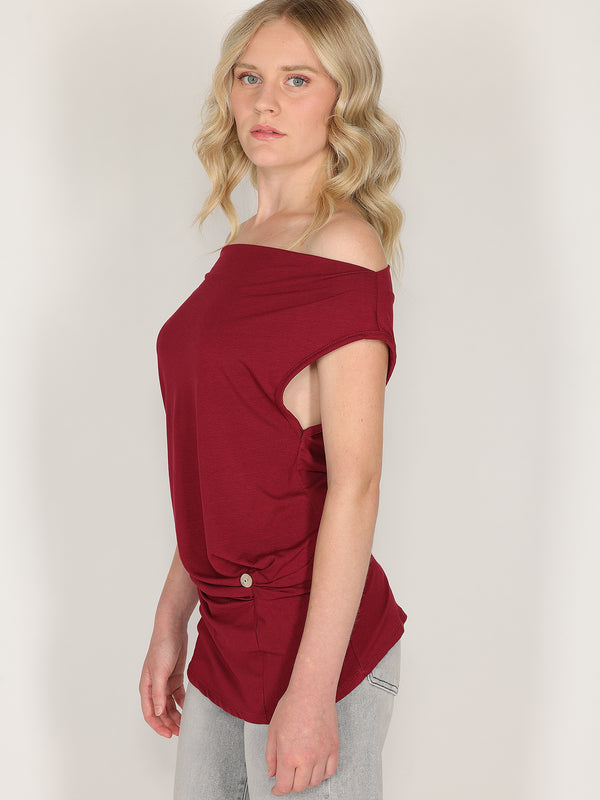 Maglia con bottone laterale
