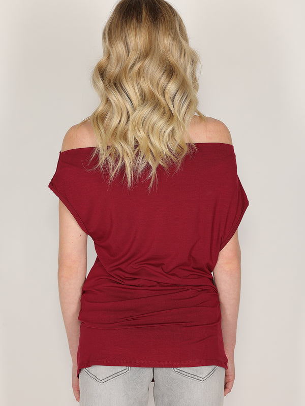 Maglia con bottone laterale
