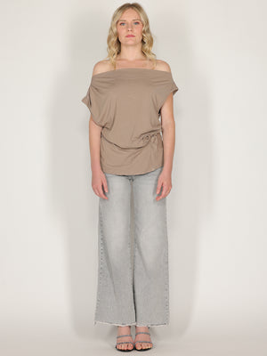 Maglia con bottone laterale