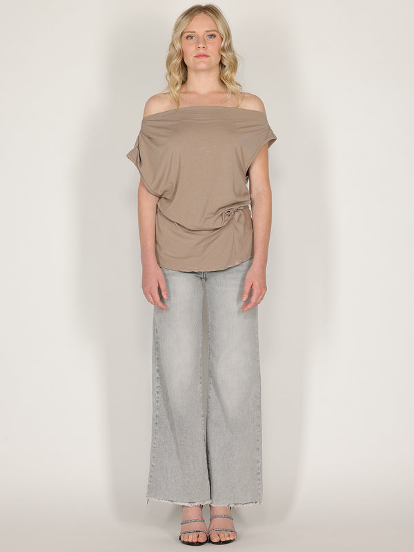 Maglia con bottone laterale