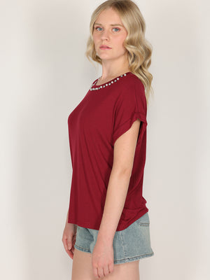 T-shirt con perle e cristalli