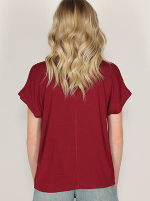 T-shirt con perle e cristalli
